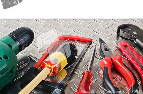 Image of Set of working tools on a metal surface