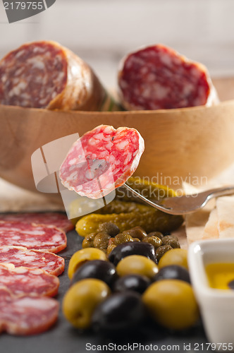 Image of cold cut platter with pita bread and pickles