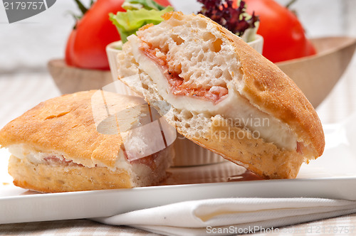 Image of ciabatta panini sandwich with parma ham and tomato