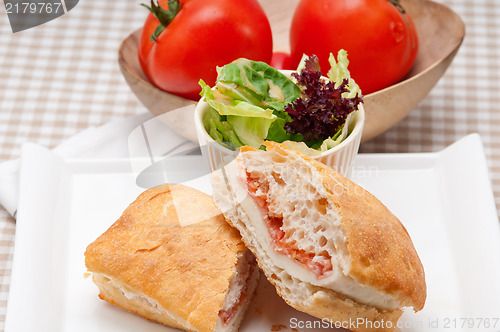 Image of ciabatta panini sandwich with parma ham and tomato