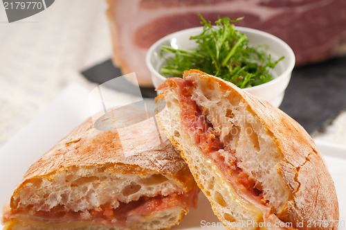 Image of ciabatta panini sandwich with parma ham and tomato