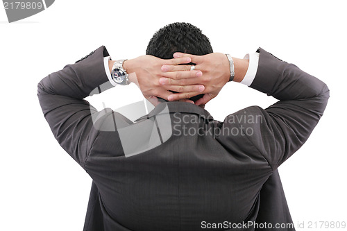 Image of back of businessman holding hands on head on white background 