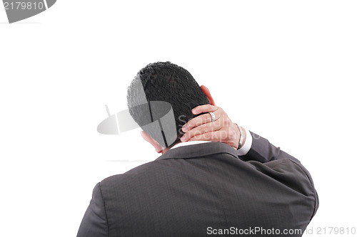 Image of Young businessman having neck pain 