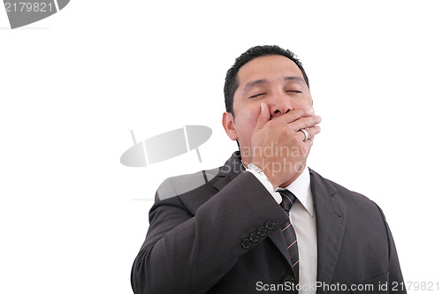 Image of Exhausted sad businessman covering his mouth by hand