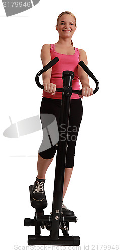 Image of Blonde Woman Exercising on a Stepper