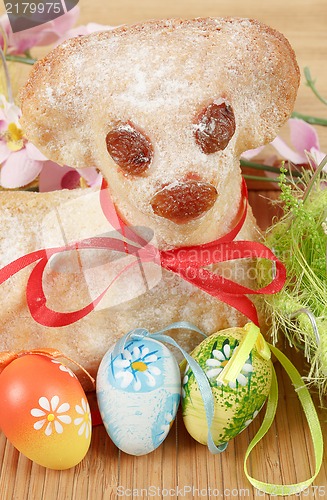 Image of Easter lamb with painted eggs