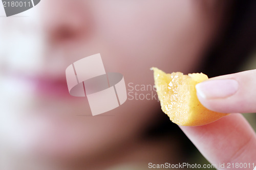 Image of Women with apricot 