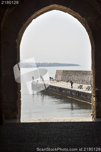 Image of ancient arch on the sea of Cefalu