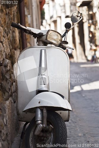 Image of old white vespa