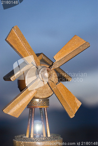 Image of wooden windmill. concept of energy