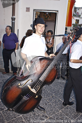 Image of Hungarian folk group. men with double bass
