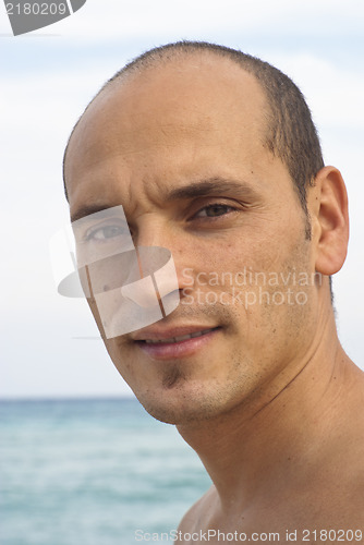 Image of Portrait of man on the beach