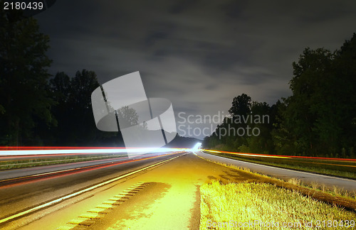 Image of highway traffic at night