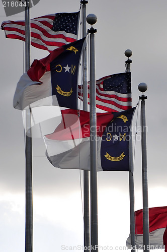 Image of north carolina and american flags