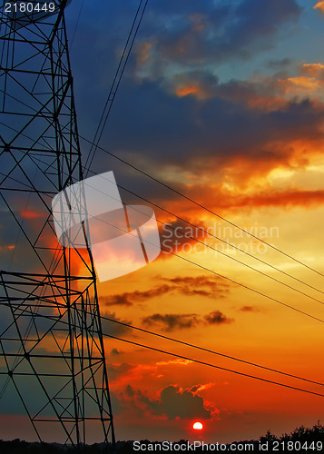 Image of Electric grid network power high voltage transmission lines pylo