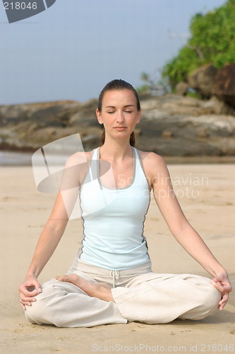 Image of Young woman exercising