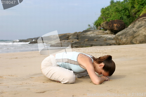 Image of Young woman exercising