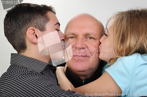 Image of family portrait of elderly father with children