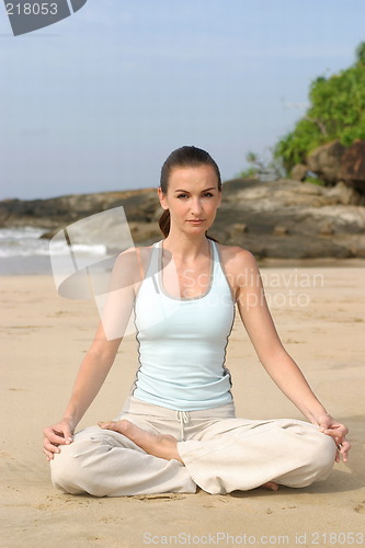 Image of Young woman exercising