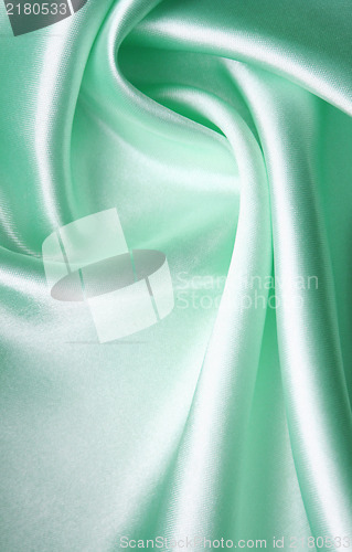 Image of Smooth elegant azure silk as background