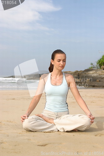 Image of Young woman exercising