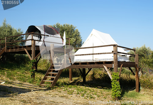 Image of tents on stilts