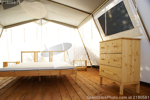 Image of inside a large luxurious tent