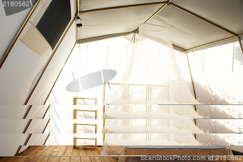 Image of inside a large luxurious tent