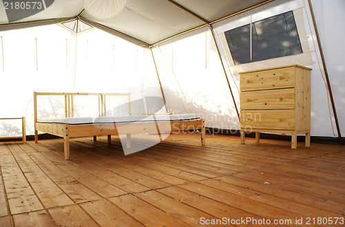 Image of inside a large luxurious tent