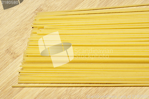 Image of spaghetti on wooden board