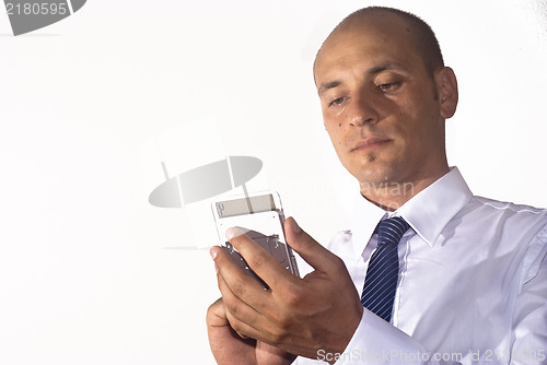 Image of businessman use calculator