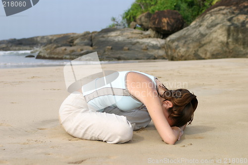 Image of Young woman exercising