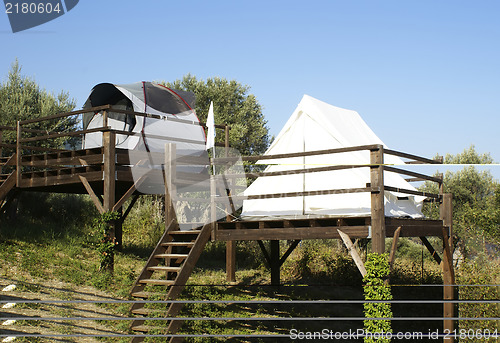 Image of tents on stilts