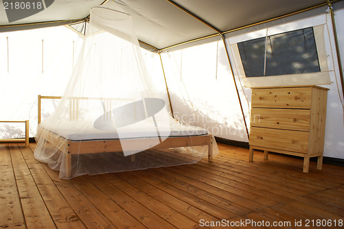 Image of inside a large luxurious tent