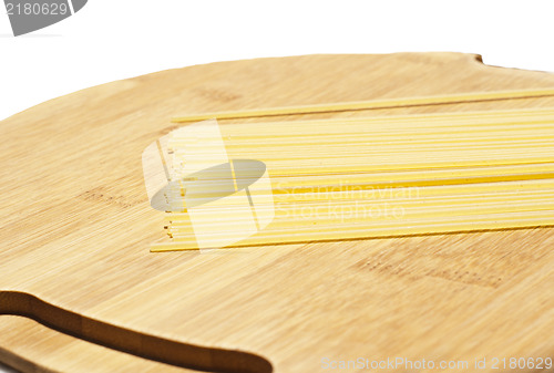 Image of spaghetti on wooden board