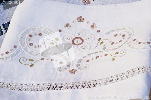 Image of carved and embroidered cloth. handmade