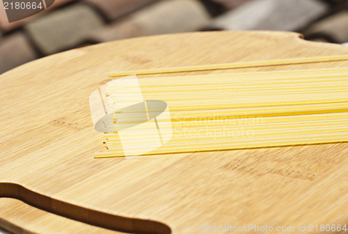 Image of spaghetti on wooden board