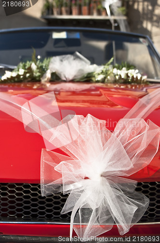 Image of red wedding car