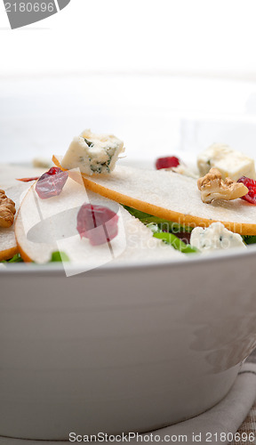 Image of Fresh pears arugula gorgonzola cheese salad
