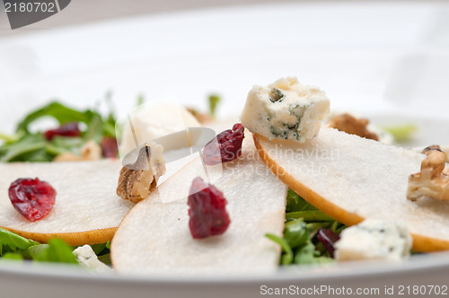 Image of Fresh pears arugula gorgonzola cheese salad