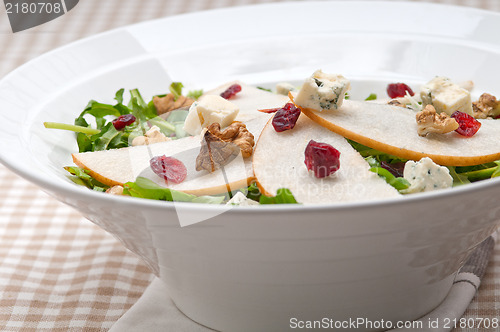 Image of Fresh pears arugula gorgonzola cheese salad