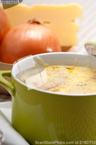 Image of onion soup with melted cheese and bread on top
