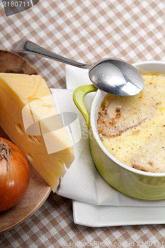 Image of onion soup with melted cheese and bread on top
