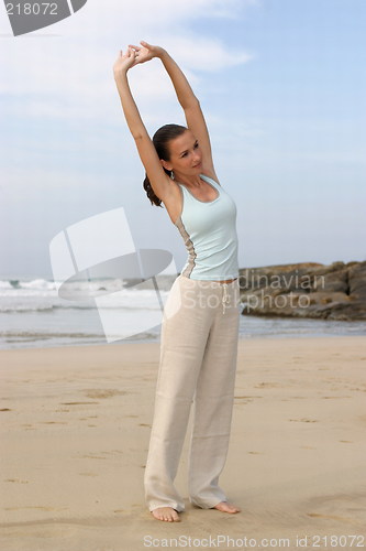 Image of Young woman exercising