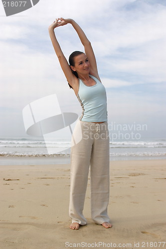 Image of Young woman exercising