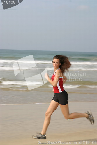 Image of Young woman exercising