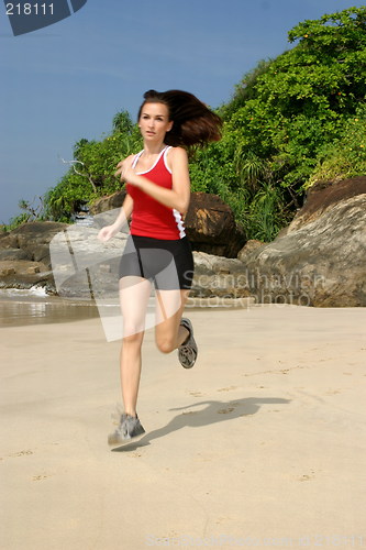 Image of Young woman exercising