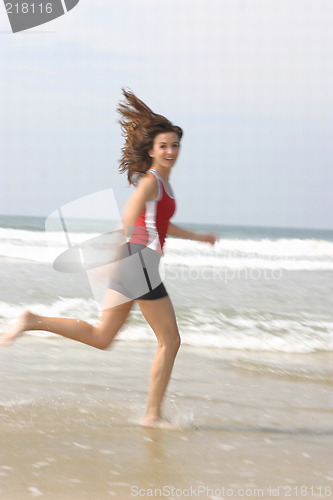 Image of Young woman exercising