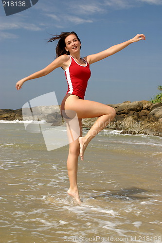 Image of Young woman exercising