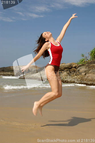 Image of Young woman exercising